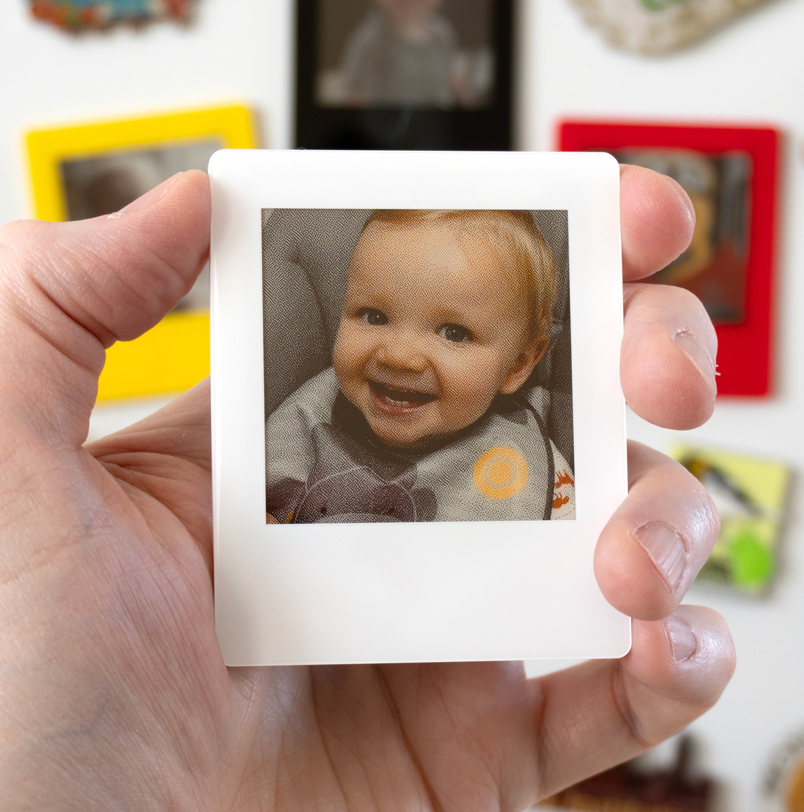 These reusable digital Polaroids are a clever way to cover a fridge in memories