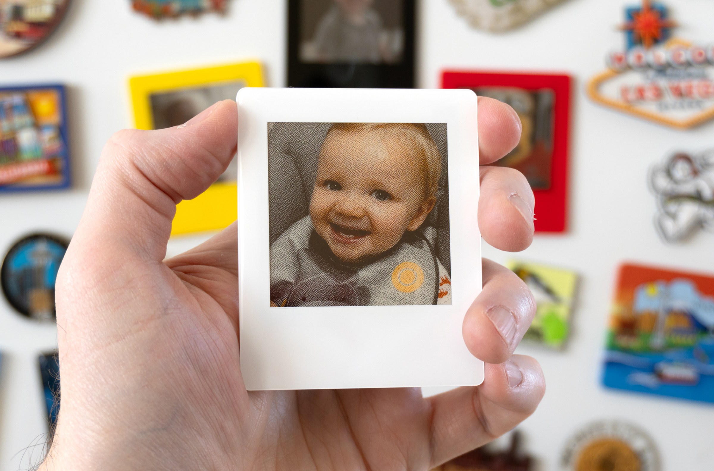 These reusable digital Polaroids are a clever way to cover a fridge in memories