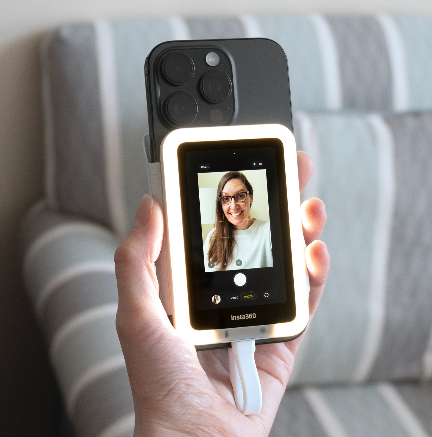 Insta360’s Snap is a tiny magnetic phone screen for taking rear-camera selfies